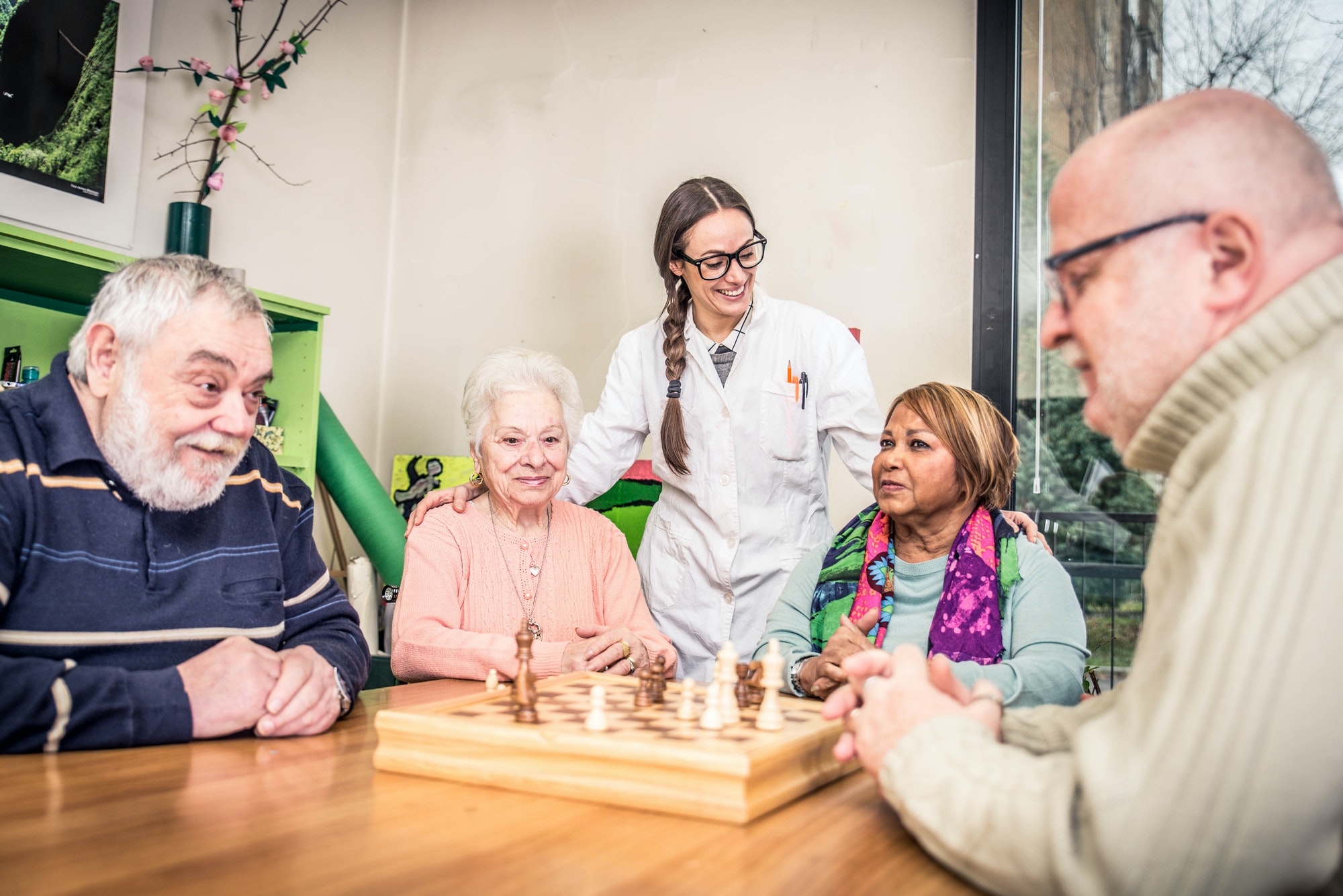senior-people paying chess and hanging out